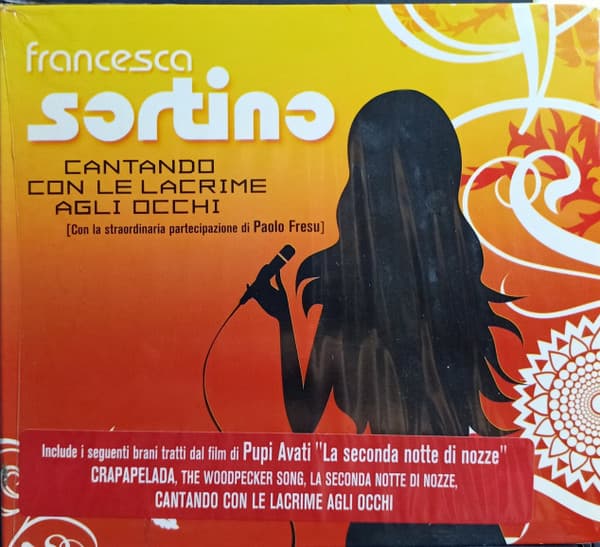 Cantando con le lacrime agli occhi